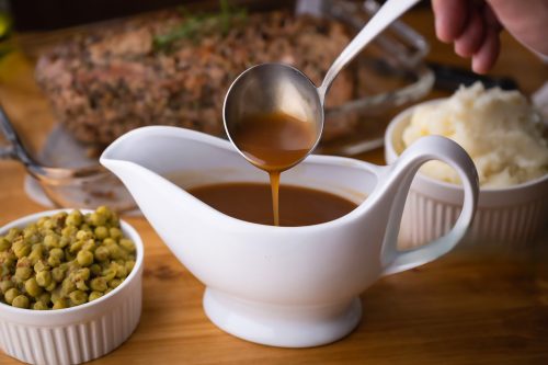 gravy sauce in sauce pod with mashed potato gravy sauce in sauce pod with mashed potato